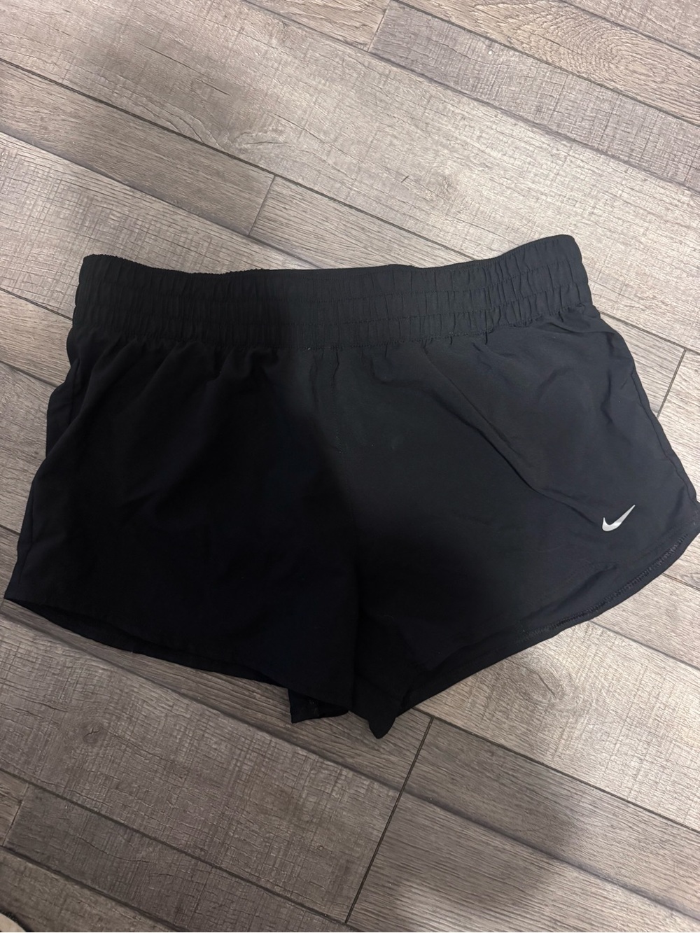Nike Women’s Black Athletic Shorts with White Swoosh